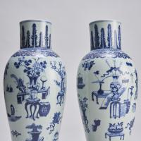 An imposing (59cm in height) pair of Nineteenth Century baluster-form blue and white vases