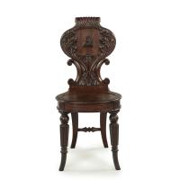 Regency mahogany armorial hall chairs