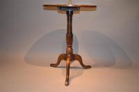A George III oak tripod pedestal table. 