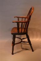 A signed Nottinghamshire child's Windsor armchair