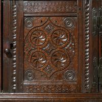 A good Charles I boarded and joined oak and elm mural cupboard, Gloucestershire, circa 1630
