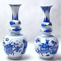 A Near Pair of Rare Chinese Triple Gourd Vases