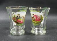 A pair of glass cups painted with a girl and a dog Bohemia circa 1820