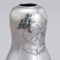 Japanese silver vase with stag beetle signed Hojo and Chorakusai, Showa period