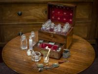 Overview of the Apothecary Cabinet in a decorative collectors setting