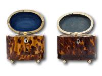 Overview of the two tortoiseshell tea caddies with the lids up