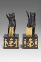 In the manner of Alexis Decaix (c. 1753-1811): A Pair of Regency Gilt-Bronze and Patinated-Bronze Griffin Paperweights