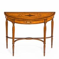 Pair of Sheraton period West Indian satinwood demi lune console tables