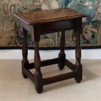 An uncommon pair of Charles II oak joint stools, circa 1670