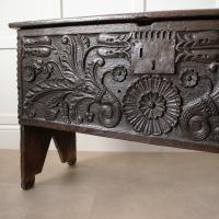 A highly impressive and finely carved boarded oak chest, West Country, circa 1630