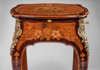 A Louis XV Ormolu-Mounted Tulipwood, Amaranth and Fruitwood Marquetry Occasional Table by Leonard Boudin. Circa 1765.
