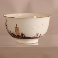 Meissen teabowl decorated with harbour scene