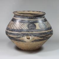 Alternative side of Chinese Neolithic earthenware funerary urn